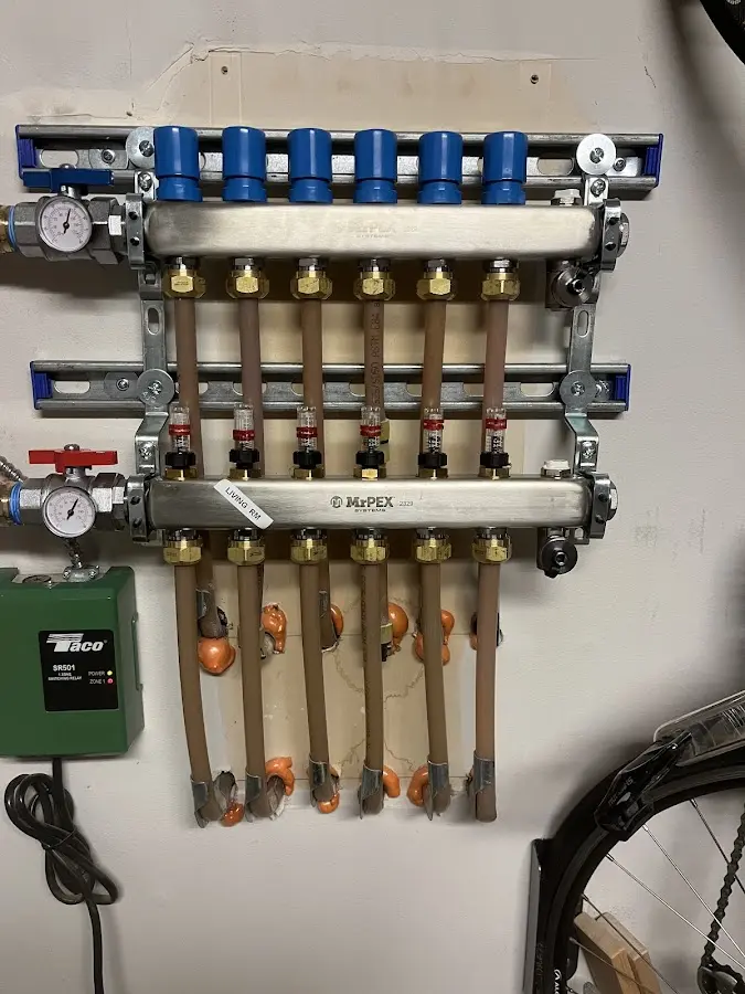 Plumber performing Gas Leak Detection at a residential property in Richmond